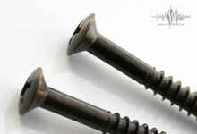 Śruba łącząca korpus z gryfem WO4,2x45 CR